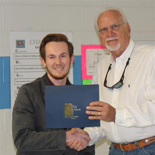 Mr. Kody Coppock with Board President Mike Almaroad presenting a certificate of recognition 